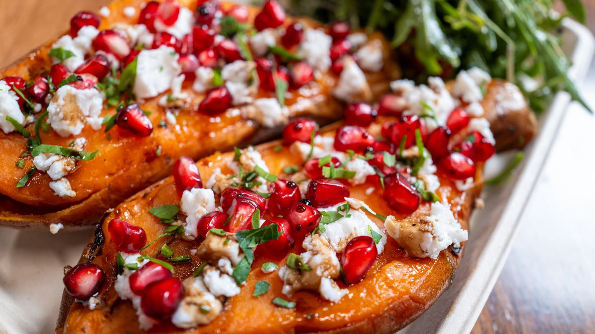 Baked sweet potatoes with feta and pomegranate, a potassium-rich dish