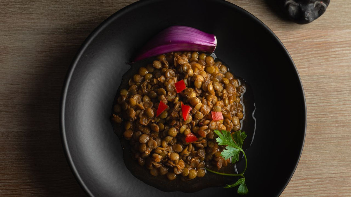 A bowl of cooked lentils, a copper-rich dish